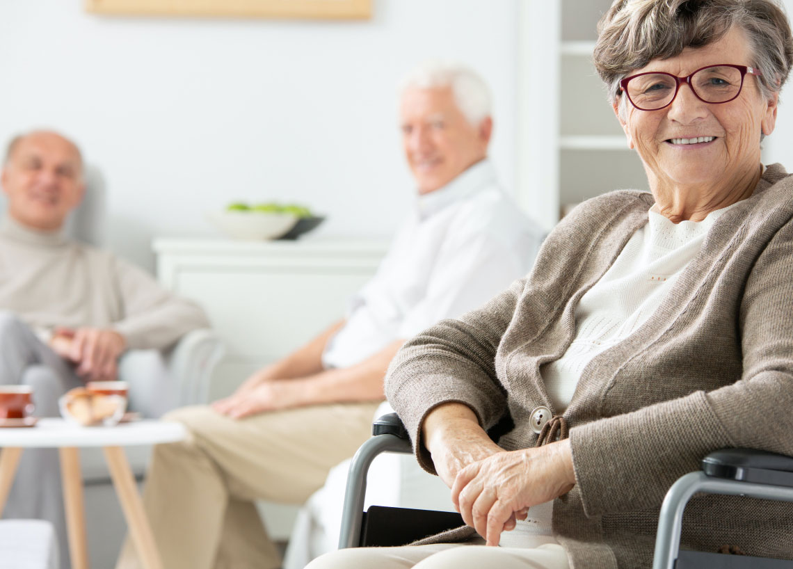 elderly people sitting in room