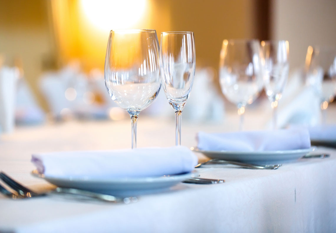 plates and glasses on table